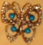 Gold-butterfly broach