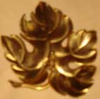 Gold-maple broach